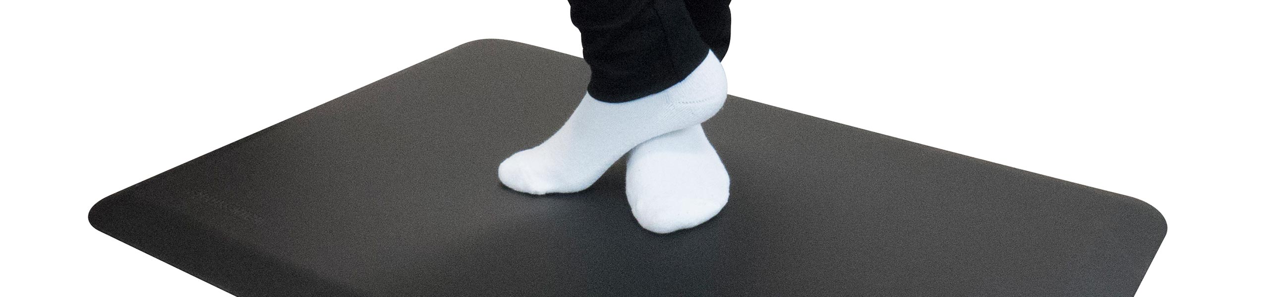 Feet on an EcoLast Premium Standing Mat
