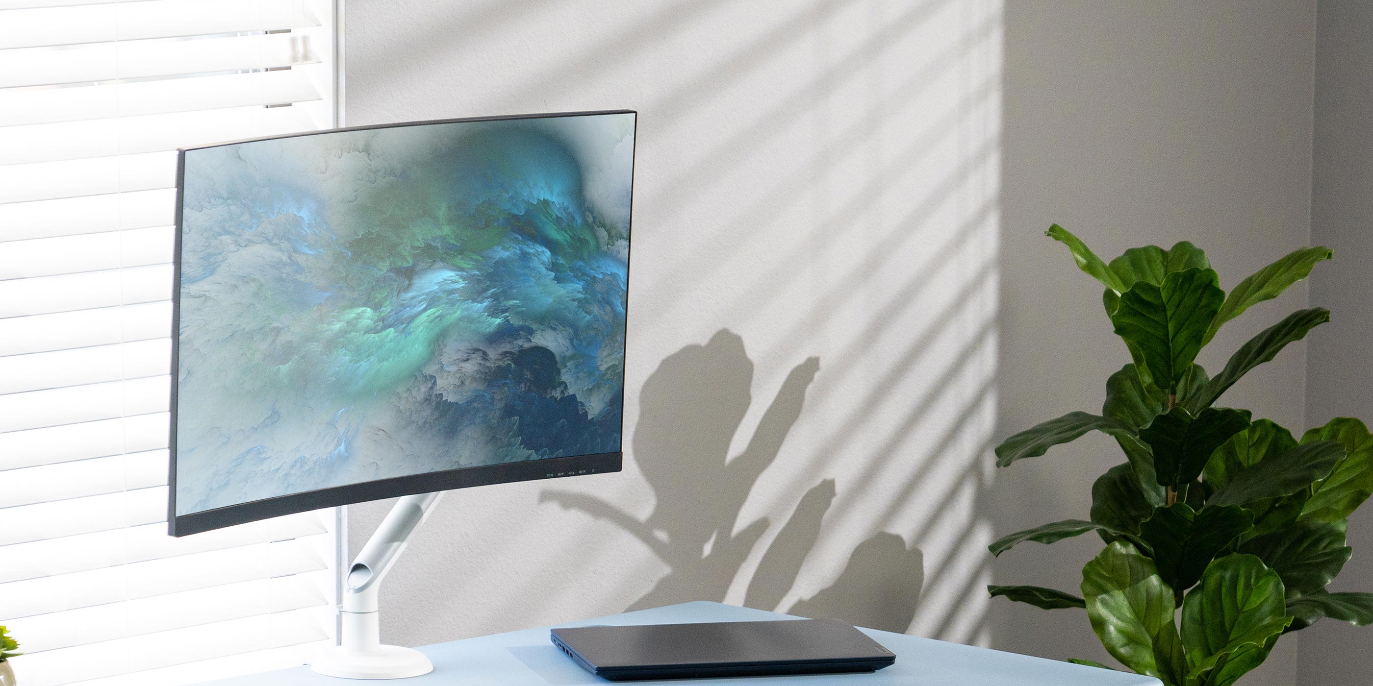 Tempo Single Screen Monitor Arm (White) on Luxe Cadet 3D Laminate Desktop.